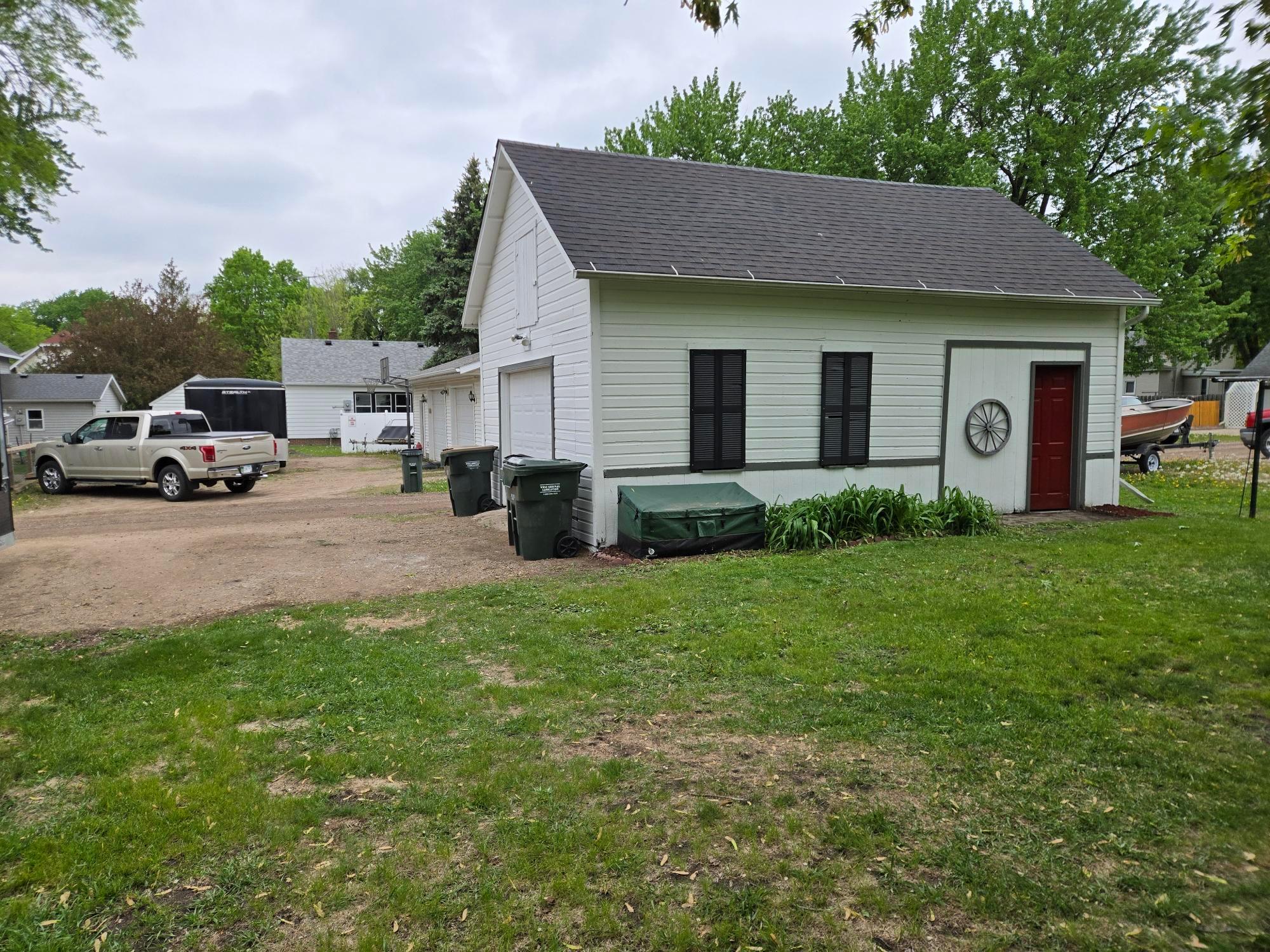 Alley access to the garage and 3 large parking spaces for your vehicles & camper