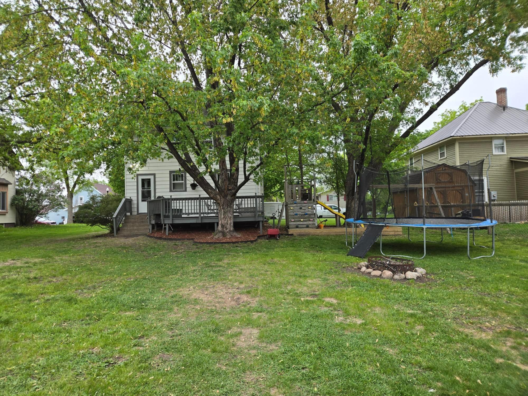 View of back yard with plenty of shade tree's for backyard gatherings!