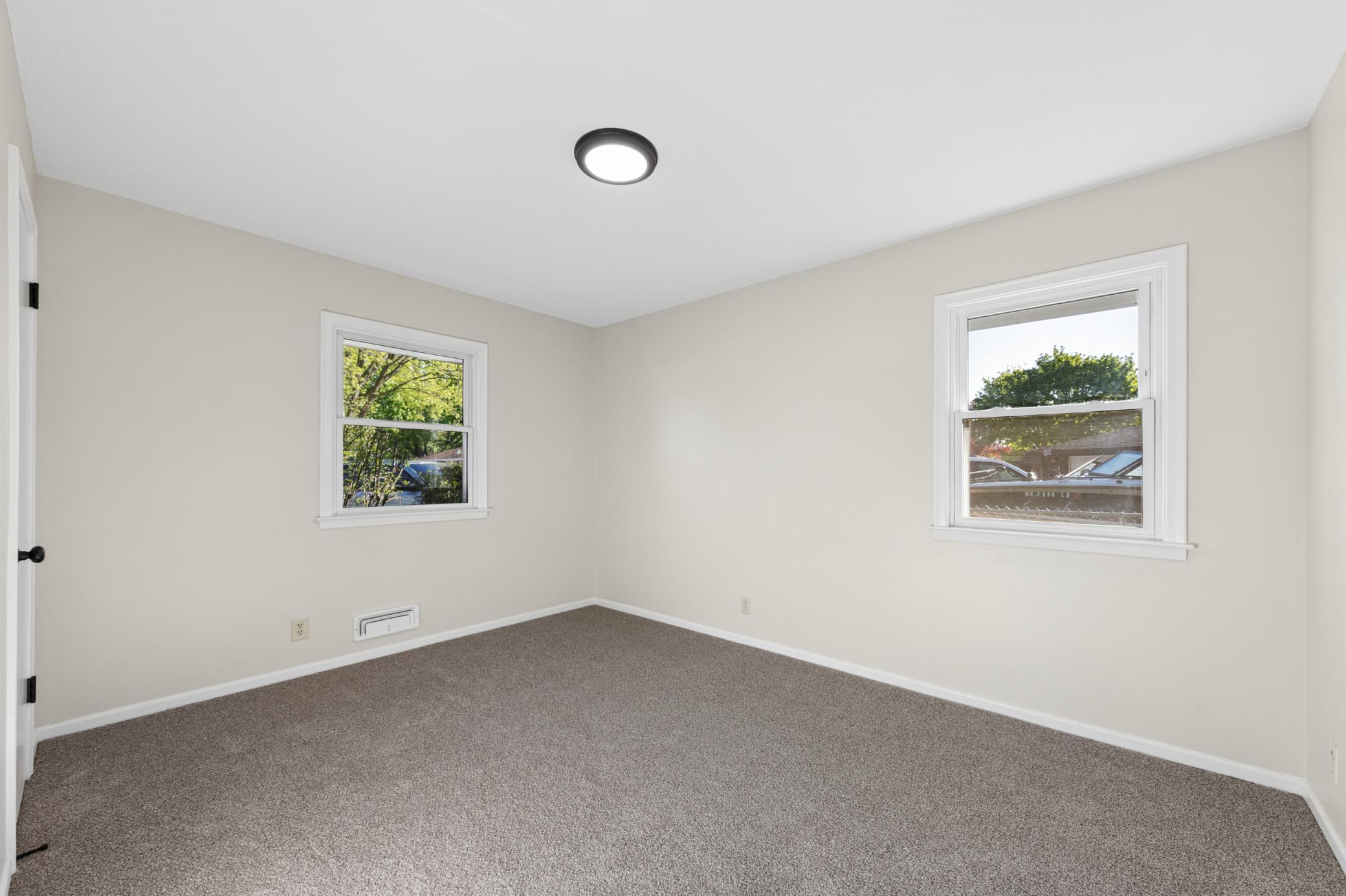 3 of 4 main floor bedrooms