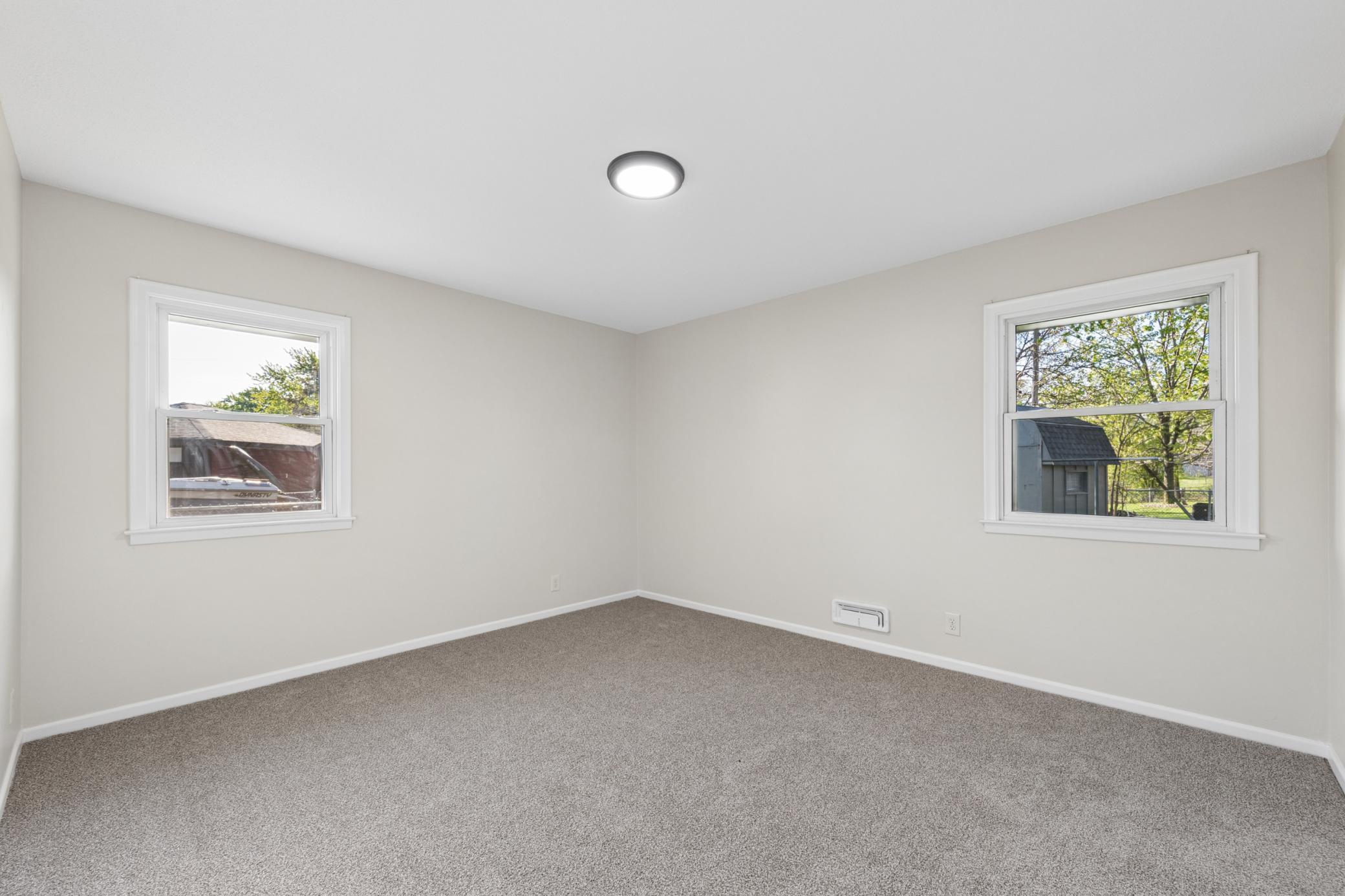 4 of 4 main floor bedrooms has a private 1/2 bath