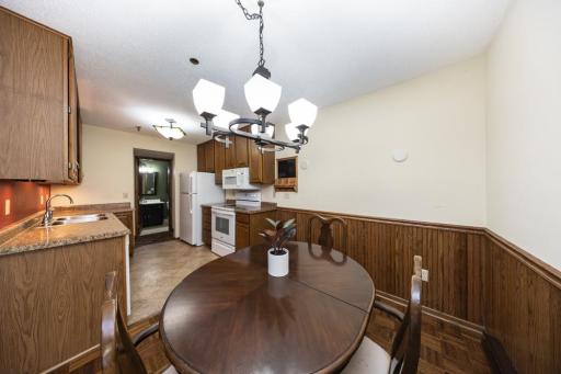 The dining room is conveniently right off of the kitchen