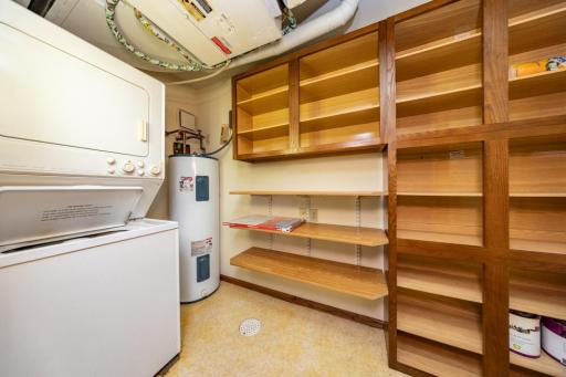 Laundry room in unit with tons of storage built in
