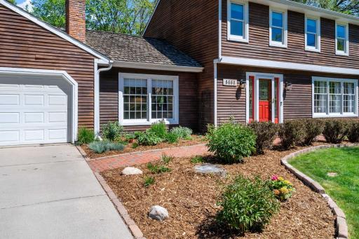 Nicely landscaped, with sprinkler system.