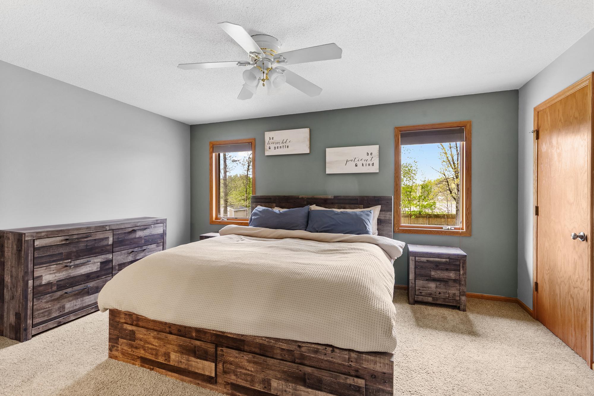 Primary Bedroom with walk-in closet and access to full bathroom