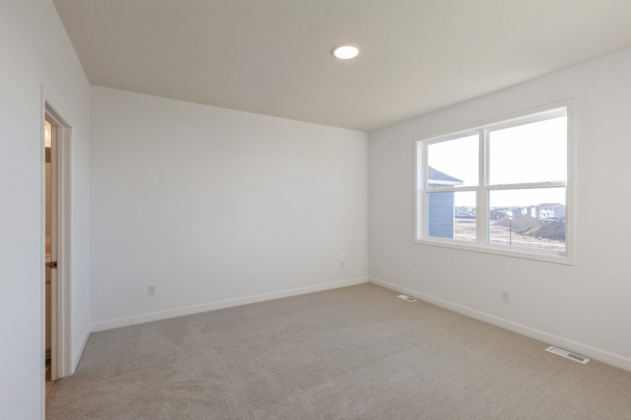 (Photo of a similar home, actual finishes may vary)