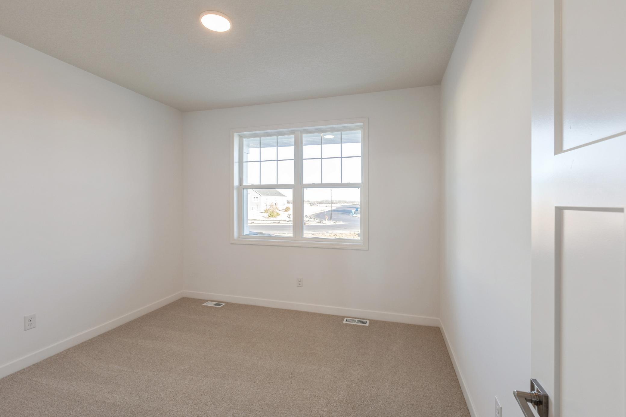 (Photo of a similar home, actual finishes may vary)