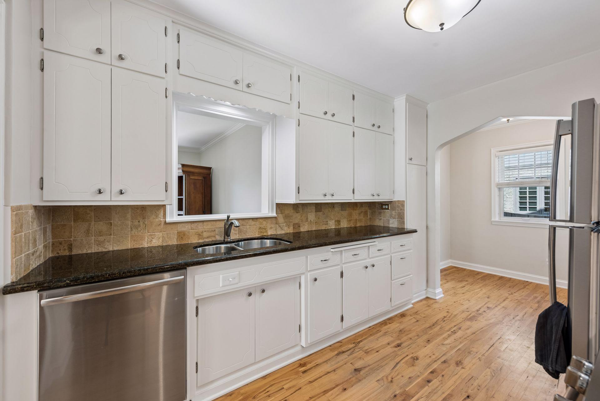 Galley kitchen with open window
