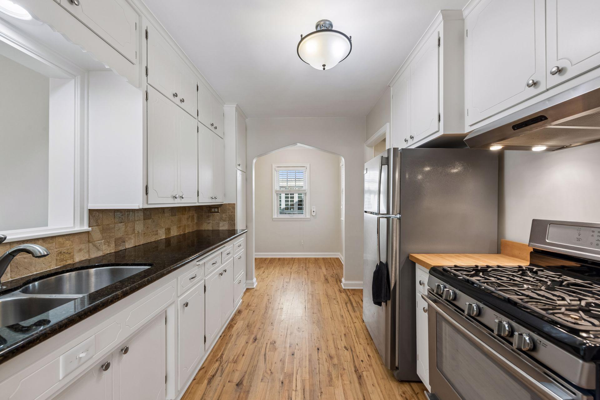 Tons of cabinets and granite counter tops, even a built in cutting board