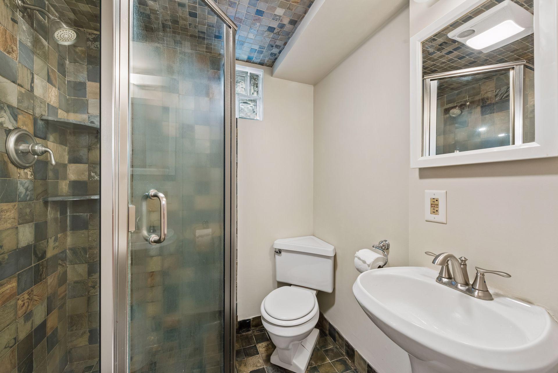 3/4 bath with tile shower and natural light