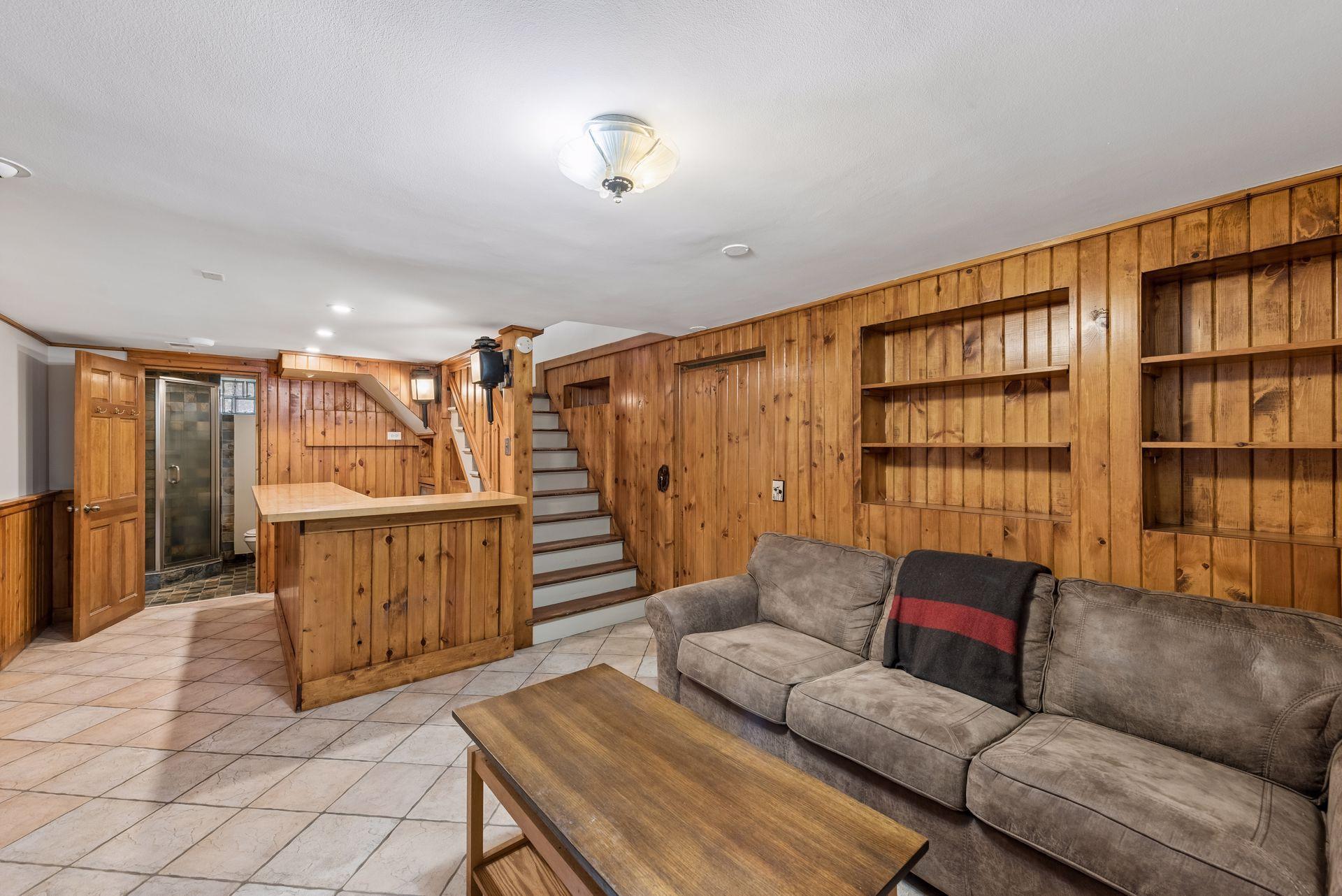 Partially finished lower level with that rustic feel.