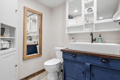 A stylish en-suite bath with modern finishes