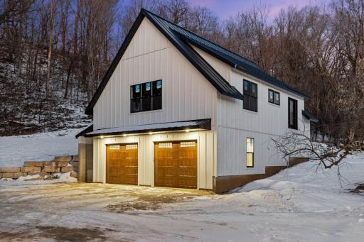 A brand-new heated garage with endless potential above