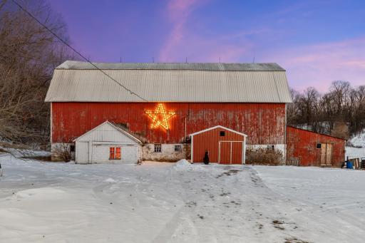 The iconic red barn anchors this picturesque hobby farm