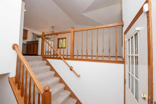 Step inside to a bright, open living space with vaulted ceilings and abundant natural light.