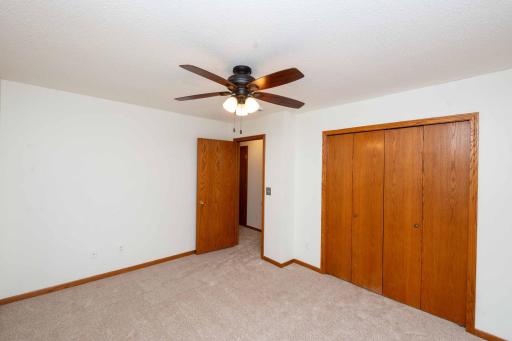 Ceiling fan and closet space.