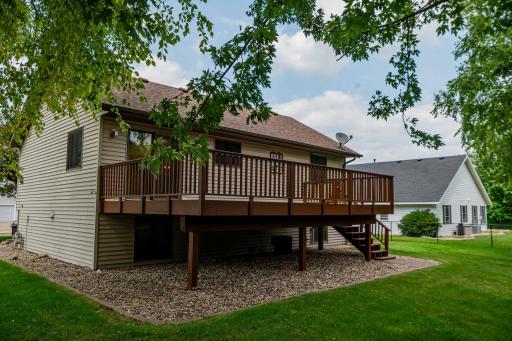 Massive deck, just power washed and stained. Flat Lot for Games. Notice easy care landscaping. MOVE IN READY! Bring in your toys and enjoy the rest of the summer!.