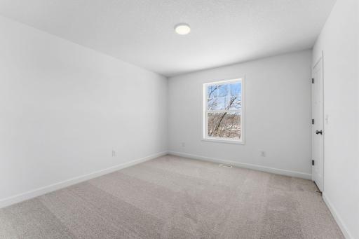 The fourth bedroom is situated on the other end of the home, making it the perfect option for a guest room.