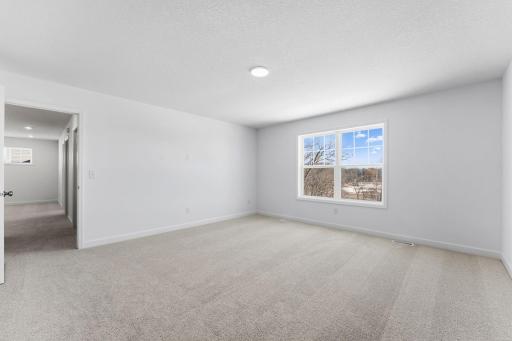 Providing the upmost in privacy, the luxurious ownerâs suite is located on the second level and has a walk-in closet and en-suite bathroom.