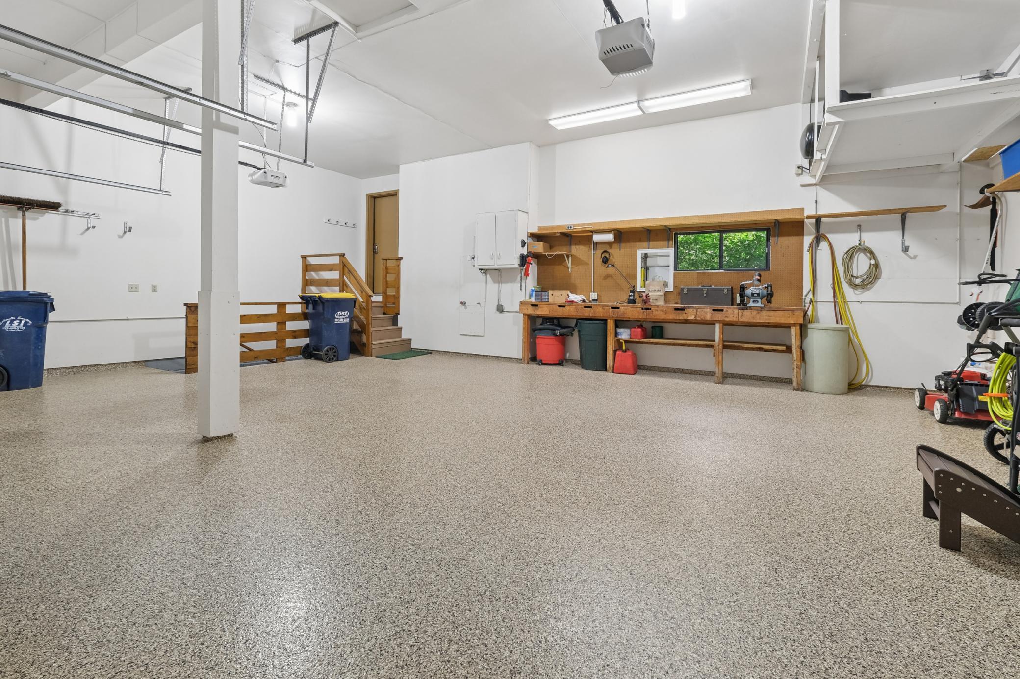 3 car garage with epoxy floor