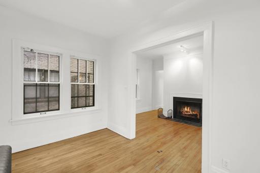 Cozy Sunroom opens up to the living room