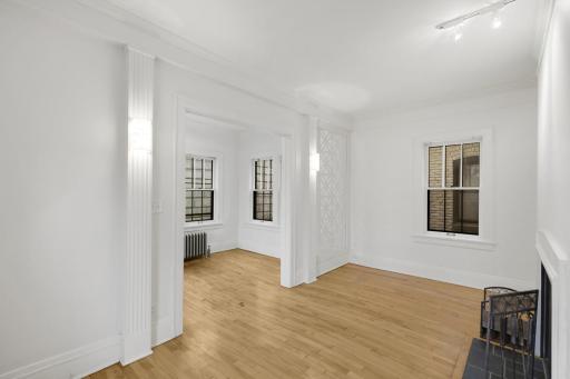 Living room and sunroom come together to make for a large, relaxing space