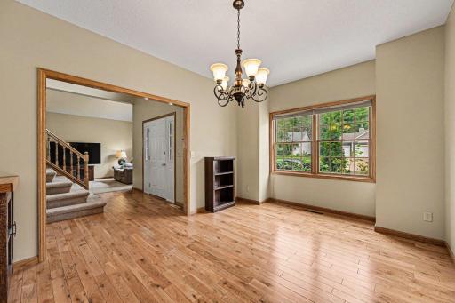 Welcome guests via the grand 2-story open foyer, complete w/hardwood floors & a coat closet. The front of the home features an elegant formal living room & a formal dining room built for entertaining. The entry offers a spectacular first impression!