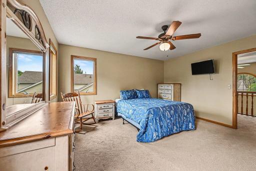 Pure comfort and convenience. The master bedroom comes complete with a ceiling fan and light, an expansive walk-in closet, and an attached full ensuite bathroom for ultimate privacy.