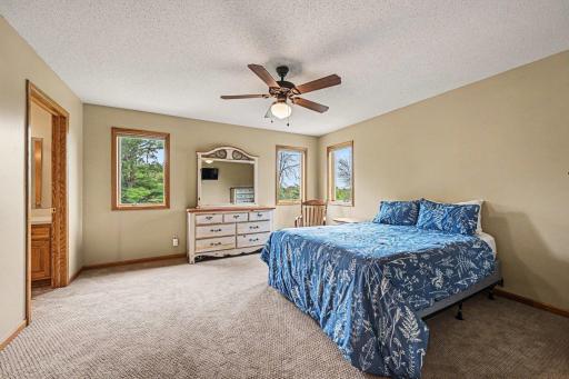 Head up the grand staircase to a large open landing. The ideal upper-level layout features 3 bedrooms on the same floor! The spacious primary suite easily accommodates a king-size bedroom set & is flooded w/beautiful natural light from large windows.