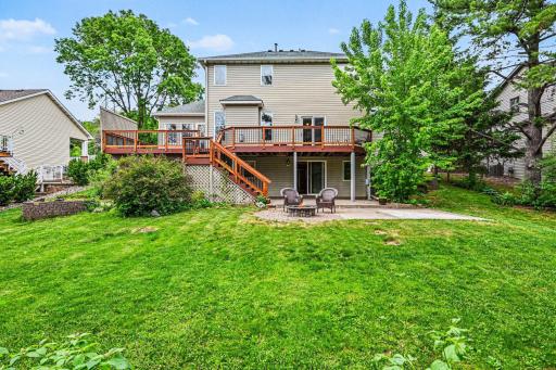 Take in the spacious backyard, large deck, & patio firepit area! The home is beautifully landscaped w/gorgeous perennial gardens & mature trees, creating a lovely, private, and wooded sanctuary you'll love. Roof & gutters were complete in 2023.