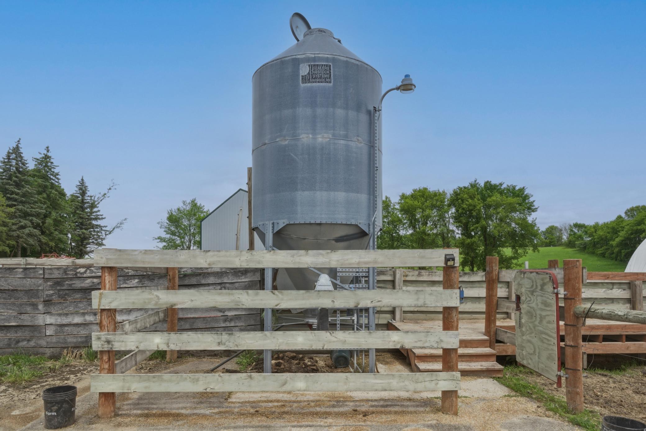Feed bin with electric auger.