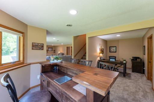The finished lookout lower level expands the living space with a large family room,Â additionalÂ bedroom, full bathroom, office area, and generous storage room.