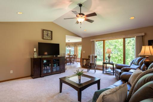 The inviting living roomÂ showcasesÂ vaulted ceilings and an open, airy feel ideal for everyday living and entertaining.