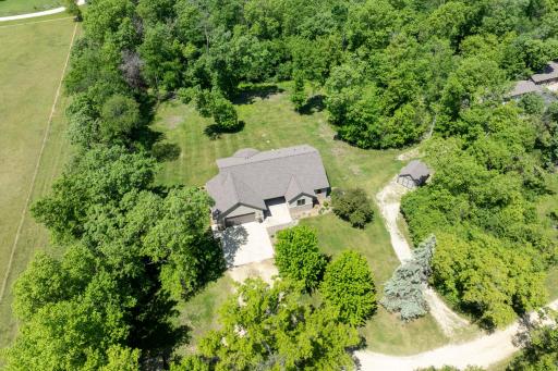 Surrounded by nature,Â youâllÂ enjoy watching deer and wild turkeys wander through the backyard, even the occasional newborn fawn, creating a truly tranquil setting just minutes from town.