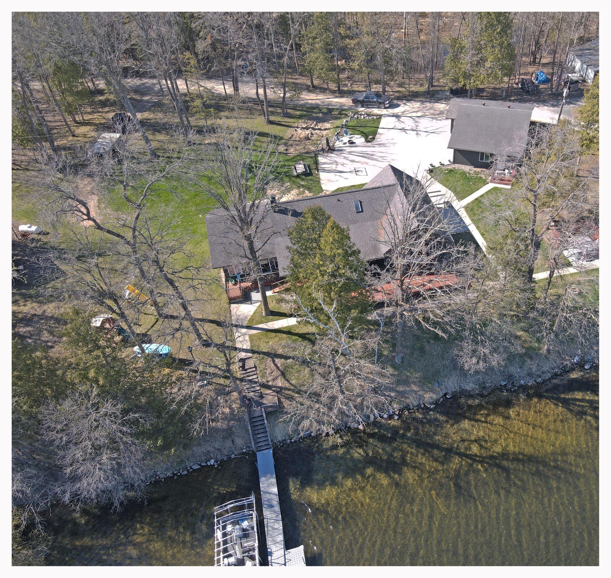 House & Heated Garage View with concrete pad!.jpg