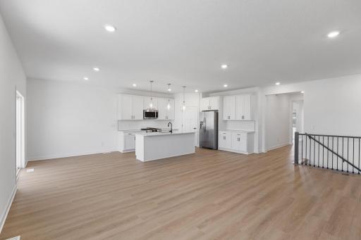 The open-concept floorplan provides for simple transitions from room to room