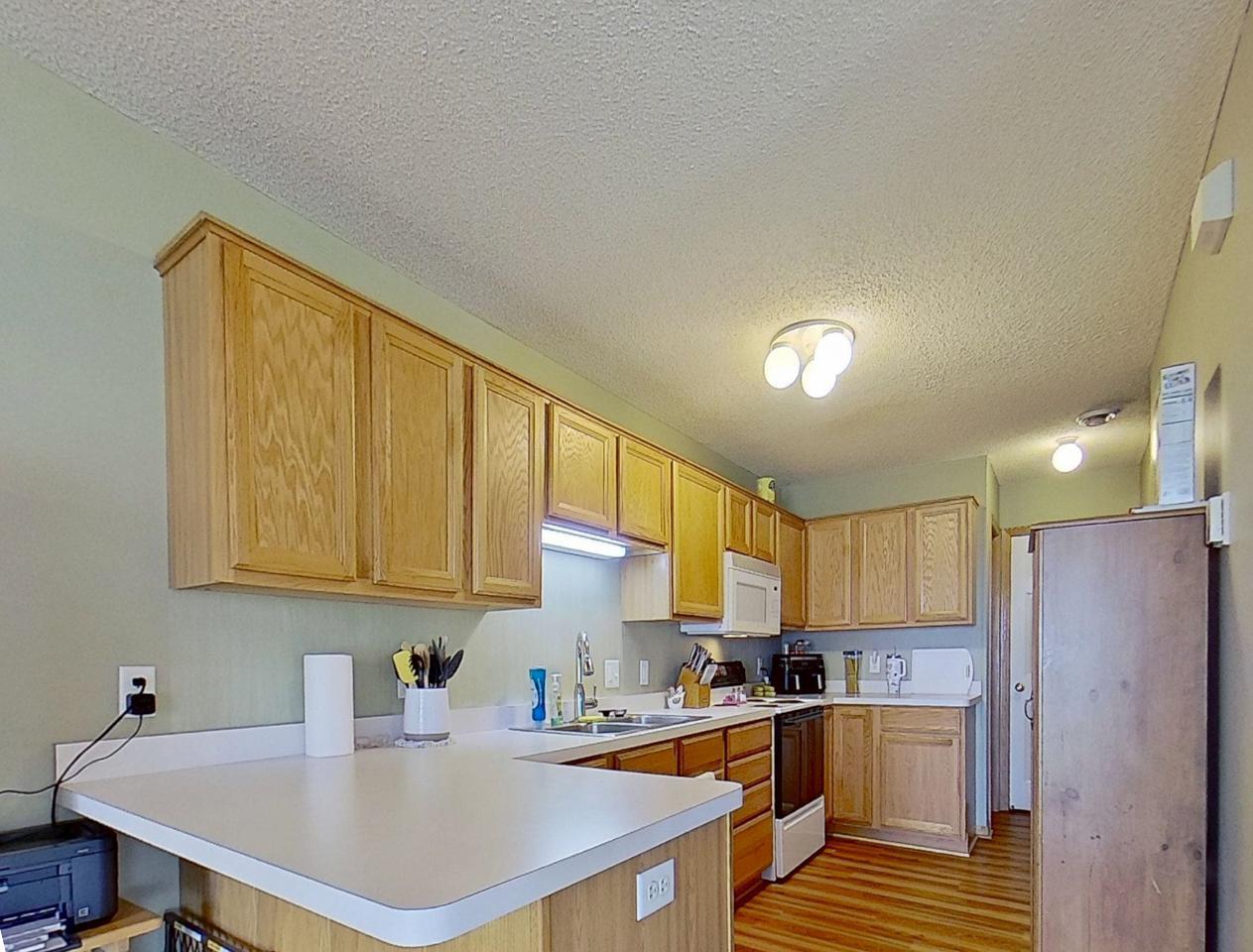 Kitchen area with breakfast bar