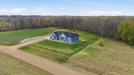 Aerial View - Property continues into the trees.