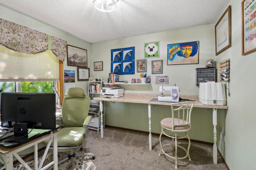 2nd main floor bedroom currently used as an office/craft room.
