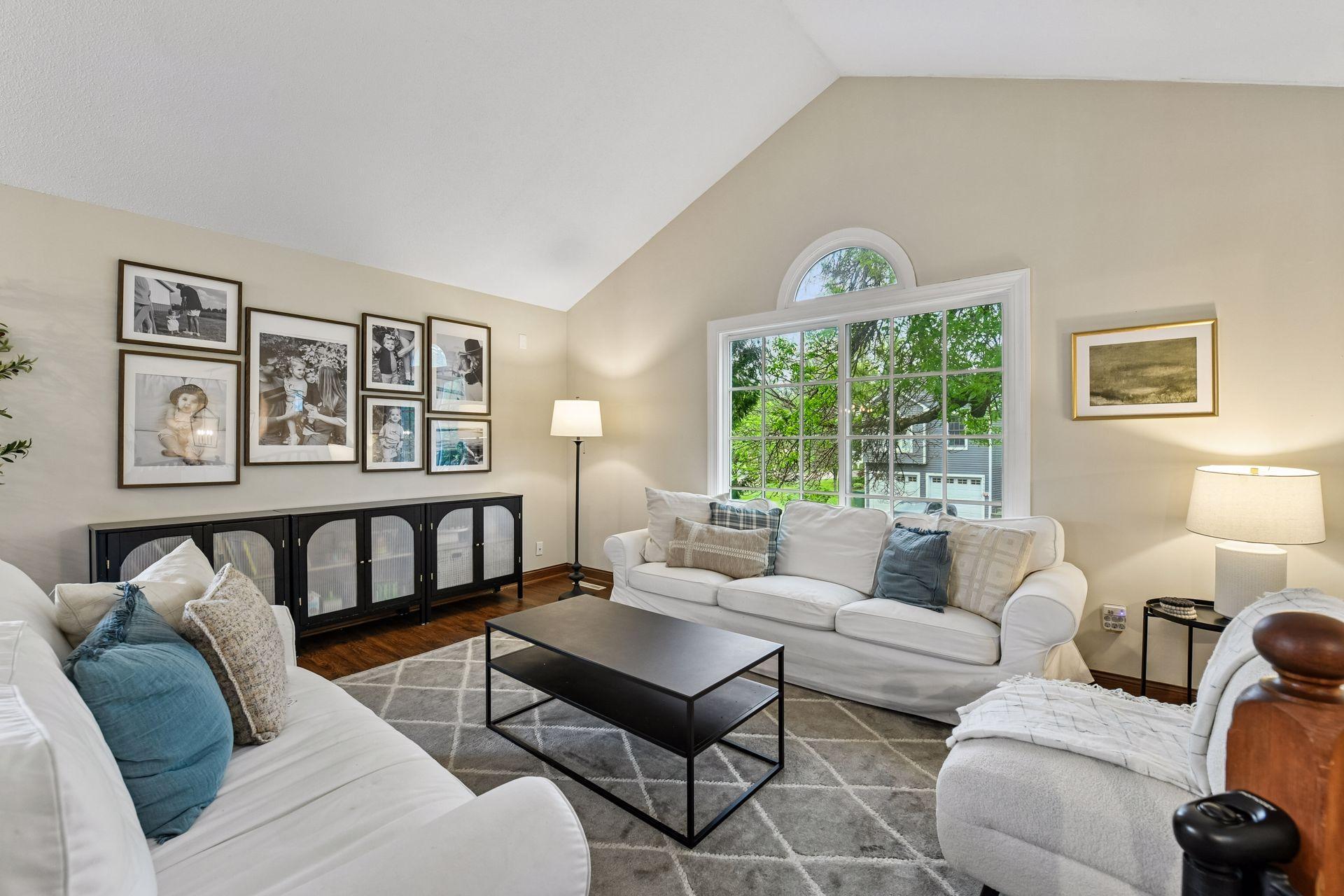The vaulted main level family room is a warm and inviting space to gather with friends and family.