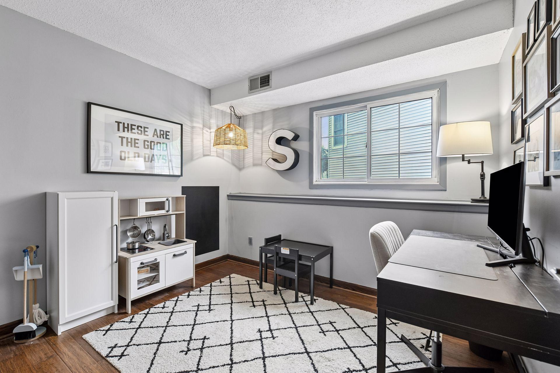 The fourth bedroom is currently used as a playroom and office.