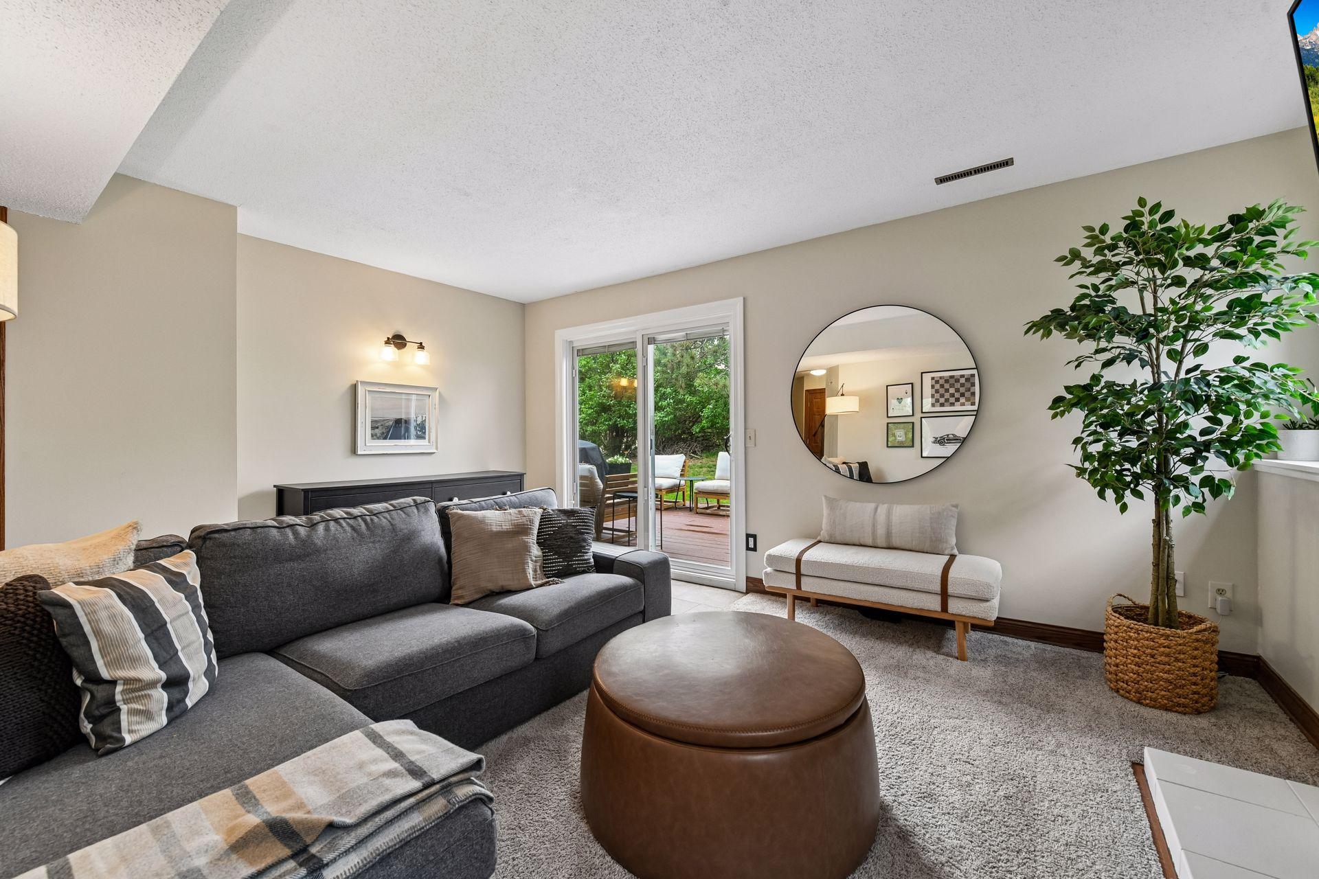 The walkout lower level steps out to the deck and private backyard.