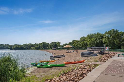 The sandy beach at French Regional Park is a favorite summer destination for swimming, relaxing and enjoying beautiful views of Medicine Lake.