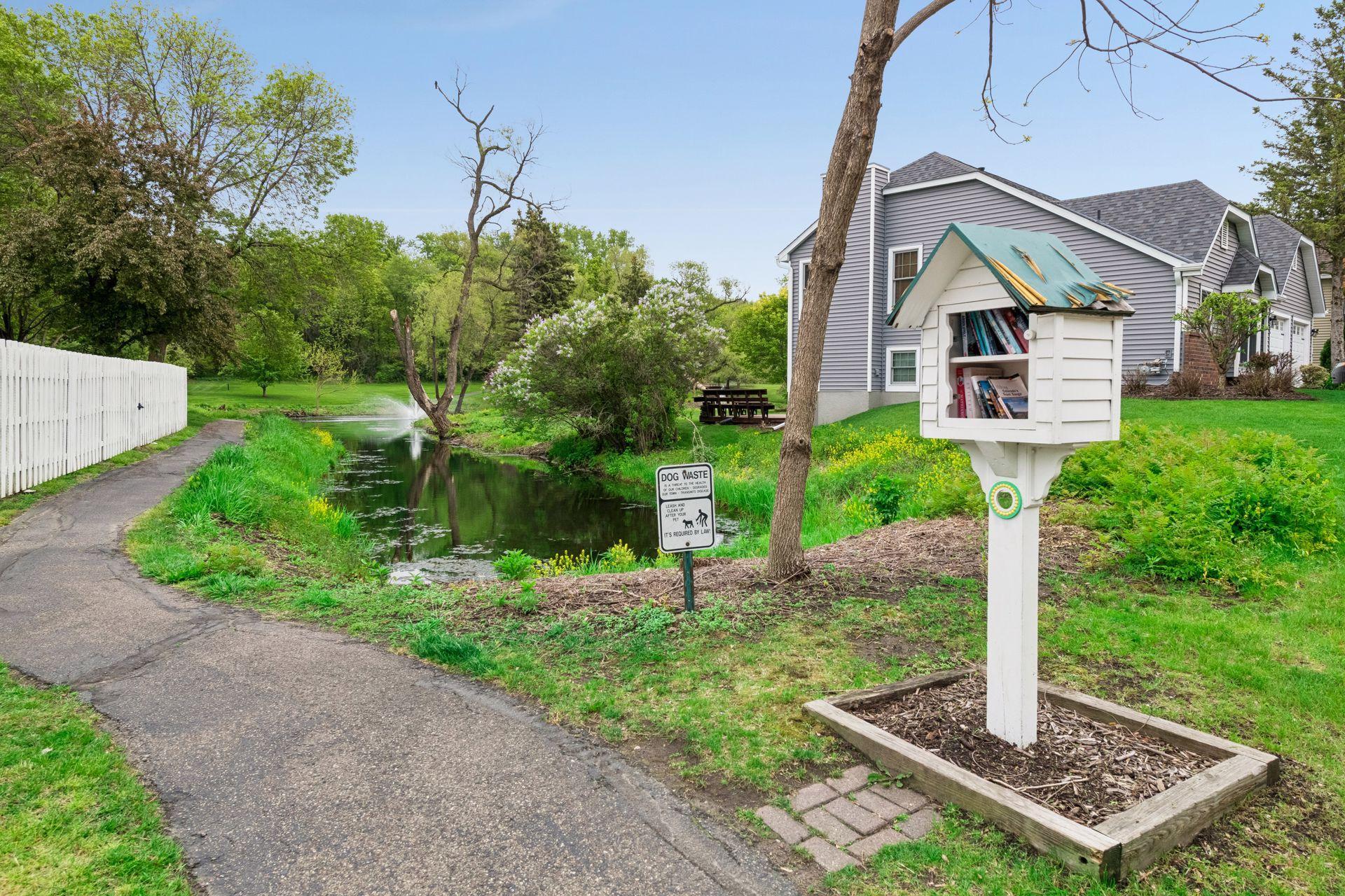 Explore the neighborhood trails - stop in at the Little Free Library on your way to the park.