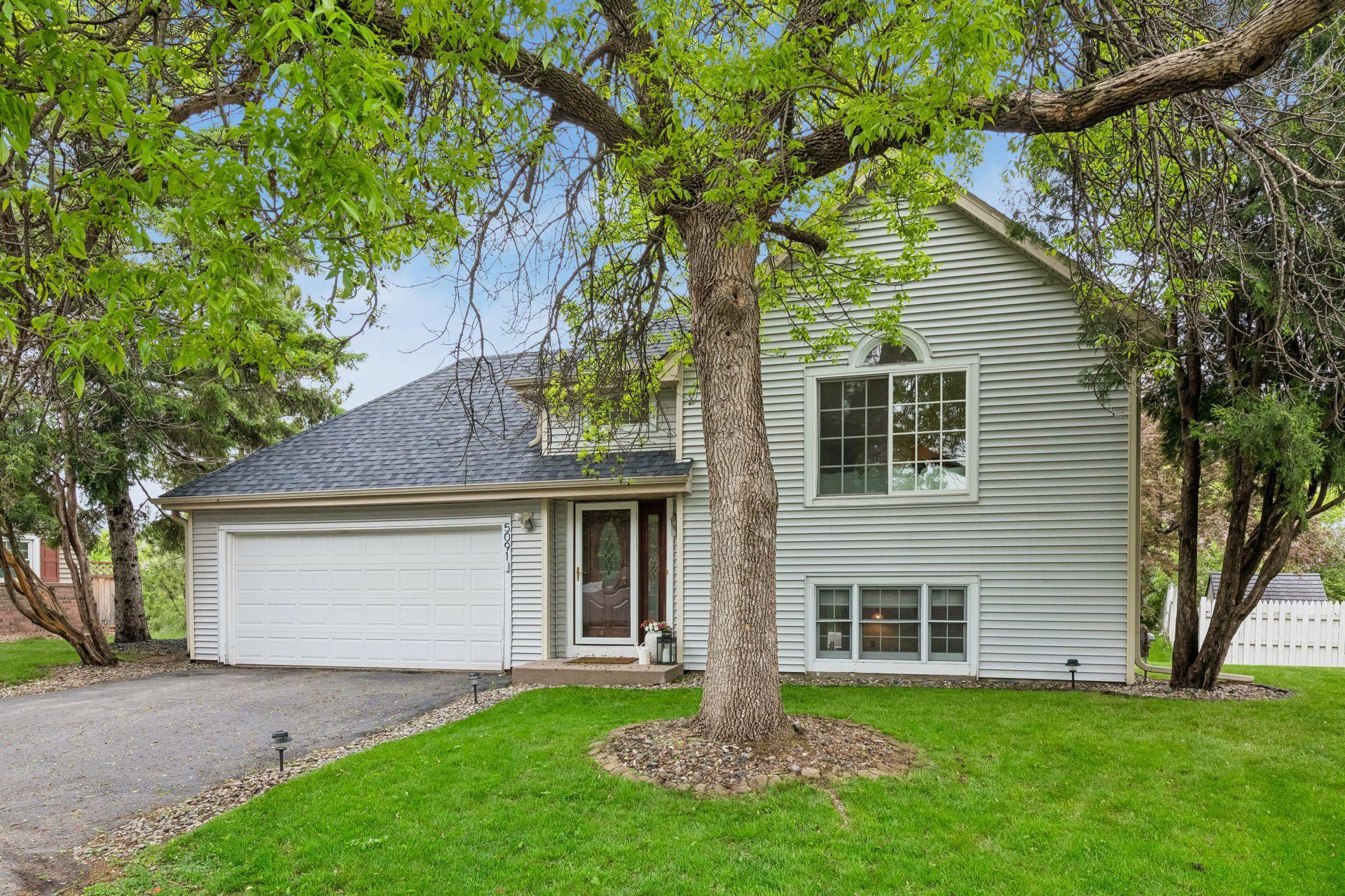 Nestled on a quiet cul-de-sac in Jamestown Village, this charming home has been freshly updated and is totally turnkey!
