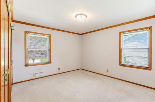 Generous primary bedroom with solid bones and excellent potential