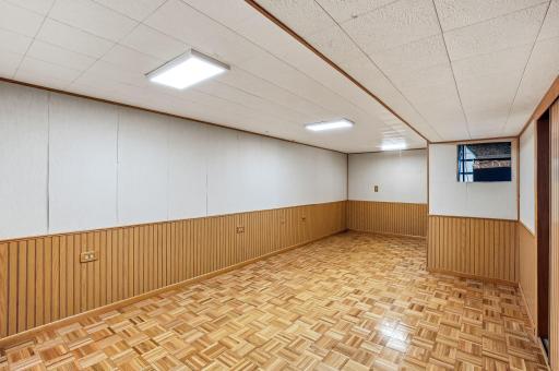 A spacious amusement room providing a versatile area for recreation or relaxation.