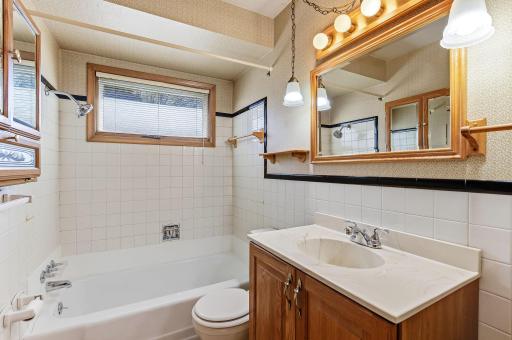 Bright main-level full bath offering comfortable everyday convenience.