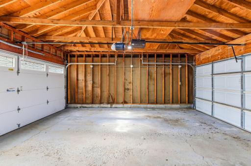 Back garage door provides direct entry into the second garage, creating a seamless connection.