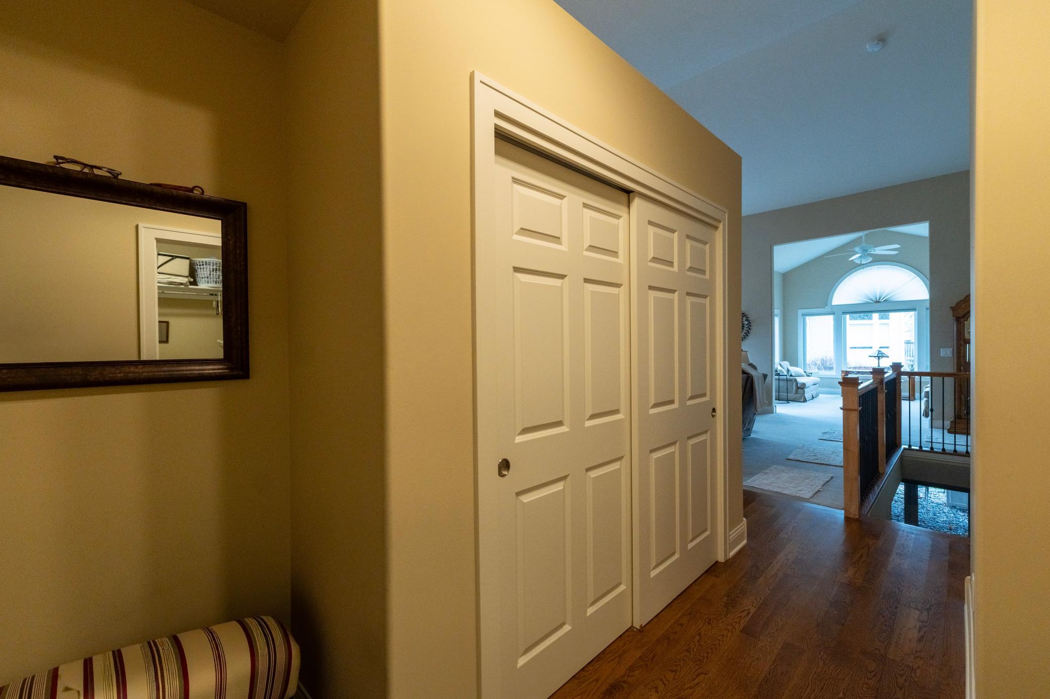 Entry from garage, hall closet - main floor