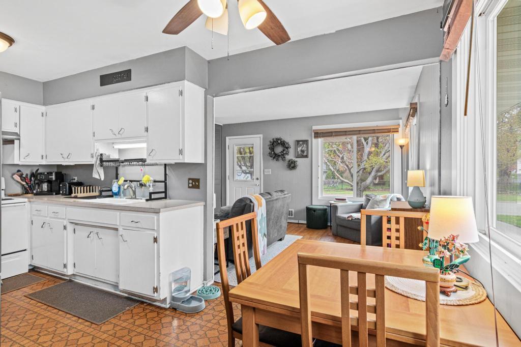 Special kitchen with abundant cabinetry and easy flow to the adjoining dinette area.